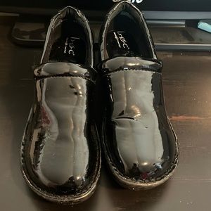 Born Concept women's size 10/42 black patent leather clogs